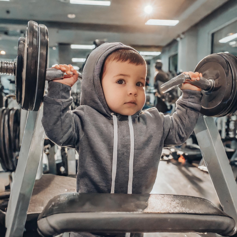 Baby lifting weights